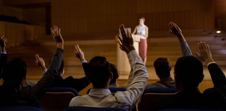 female-business-executive-giving-speech-1-2