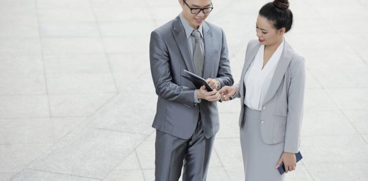 entrepreneurs-checking-data-tablet-2