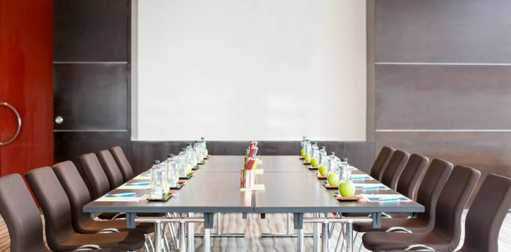 empty-meeting-room-with-table-whiteboard-1-1-2